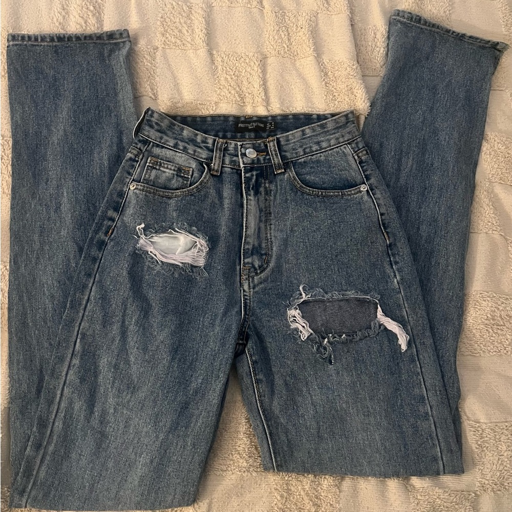 Distressed Blue Jeans